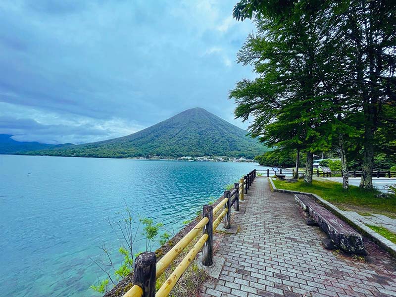 Scenic lake view with wooden pier in Hokkaido, Japan – Green Apple Travel private tours